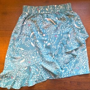 Light blue ruffled skirt covered in tiny unique fish and sea creatures!